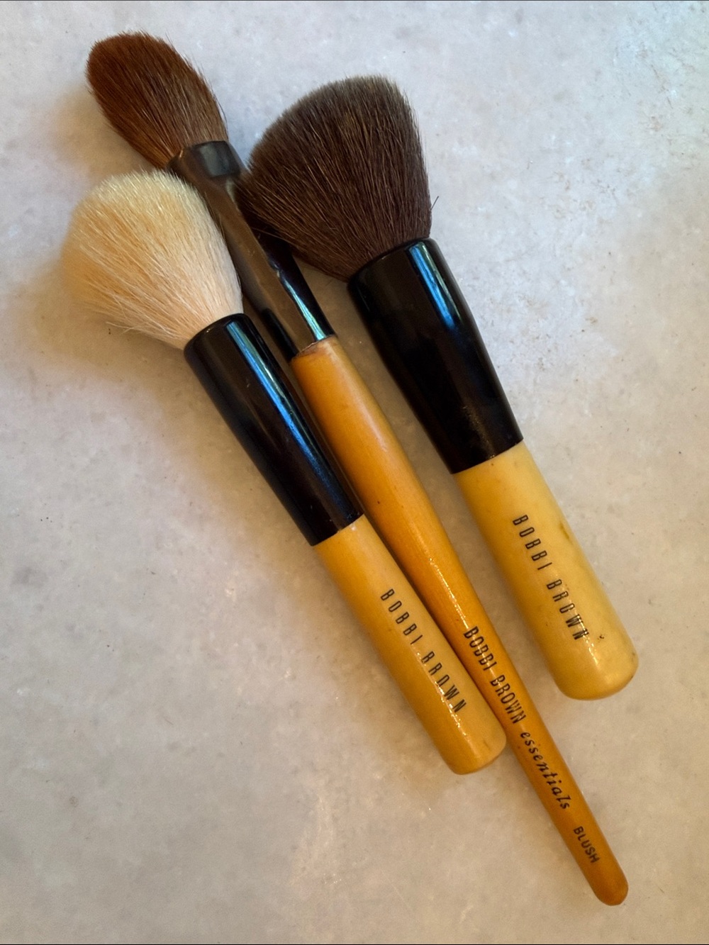 3 Bobbi Brown pro makeup brushes: bronzer, brush, face blender